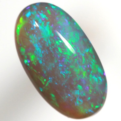 SOLID BLACK CRYSTAL OPAL Bright and sparkling green and turquoise purple fire